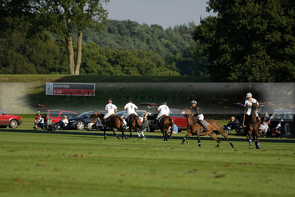 Pluma Negra (white) v Shoreline (black) in the Brecknock Cup Subsidiary final polo match played on Sunday 25 August 2013 at Cowdray Park Polo Club on Ambersham 1. 2013.10.12 www.polopictures.co.uk