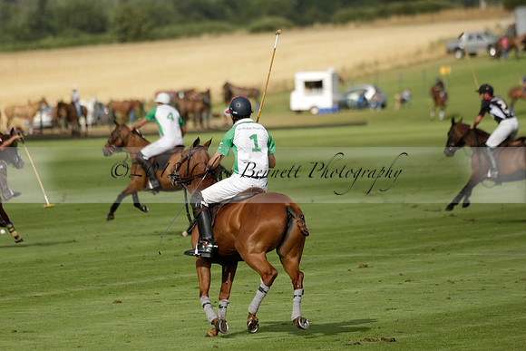 Jaeger Le Coultre (black)  v Wairakei Pastoral (white) in a Jaeger Le Coultre Holden White Cup polo match played on 29 July 2013 at Cowdray Park Polo Club on Brooksfieldwww.polopictures.co.uk