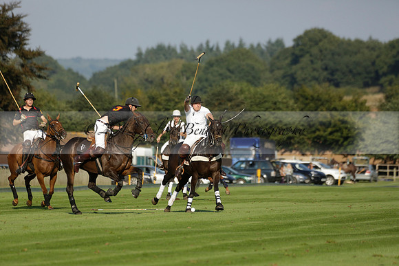 Pluma Negra (white) v Shoreline (black) in the Brecknock Cup Subsidiary final polo match played on Sunday 25 August 2013 at Cowdray Park Polo Club on Ambersham 1. 2013.10.12 www.polopictures.co.uk