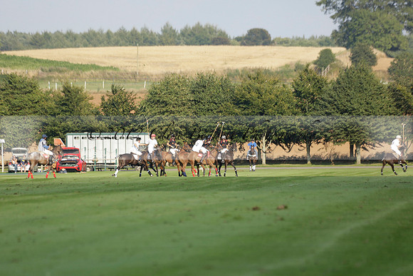 Pluma Negra (white) v Shoreline (black) in the Brecknock Cup Subsidiary final polo match played on Sunday 25 August 2013 at Cowdray Park Polo Club on Ambersham 1. 2013.10.12 www.polopictures.co.uk