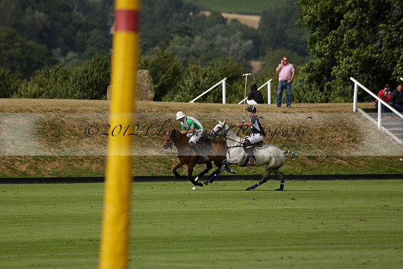 Jaeger Le Coultre (black)  v Wairakei Pastoral (white) in a Jaeger Le Coultre Holden White Cup polo match played on 29 July 2013 at Cowdray Park Polo Club on Brooksfieldwww.polopictures.co.uk