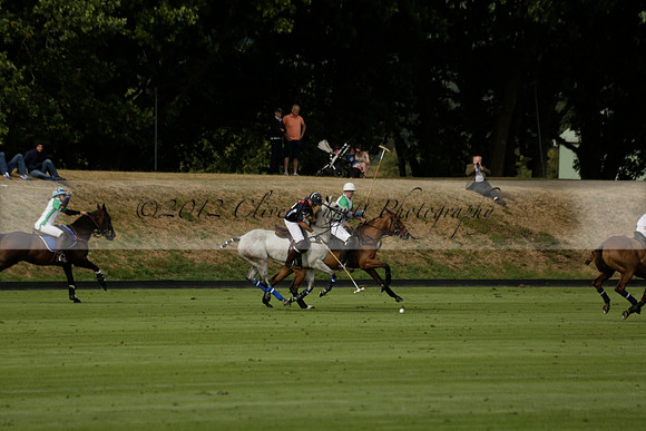 Jaeger Le Coultre (black)  v Wairakei Pastoral (white) in a Jaeger Le Coultre Holden White Cup polo match played on 29 July 2013 at Cowdray Park Polo Club on Brooksfieldwww.polopictures.co.uk