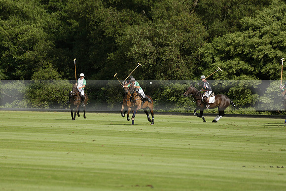 Jaeger Le Coultre (black)  v Wairakei Pastoral (white) in a Jaeger Le Coultre Holden White Cup polo match played on 29 July 2013 at Cowdray Park Polo Club on Brooksfieldwww.polopictures.co.uk