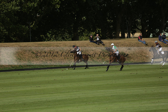 Jaeger Le Coultre (black)  v Wairakei Pastoral (white) in a Jaeger Le Coultre Holden White Cup polo match played on 29 July 2013 at Cowdray Park Polo Club on Brooksfieldwww.polopictures.co.uk