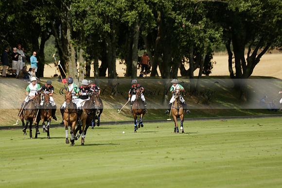 Jaeger Le Coultre (black)  v Wairakei Pastoral (white) in a Jaeger Le Coultre Holden White Cup polo match played on 29 July 2013 at Cowdray Park Polo Club on Brooksfieldwww.polopictures.co.uk