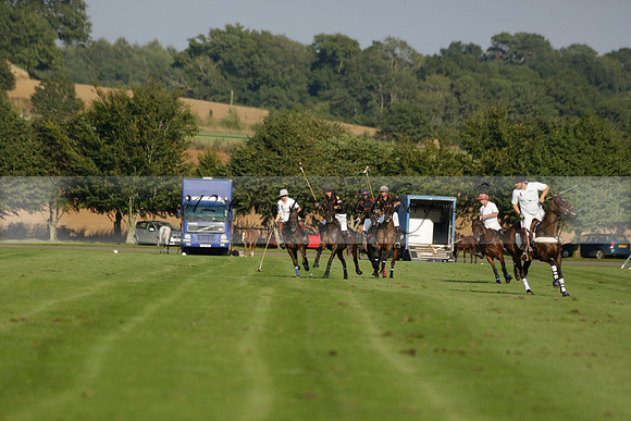 Pluma Negra (white) v Shoreline (black) in the Brecknock Cup Subsidiary final polo match played on Sunday 25 August 2013 at Cowdray Park Polo Club on Ambersham 1. 2013.10.12 www.polopictures.co.uk