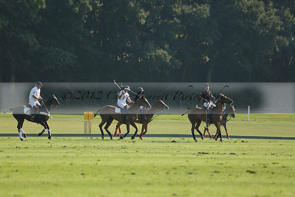 Pluma Negra (white) v Shoreline (black) in the Brecknock Cup Subsidiary final polo match played on Sunday 25 August 2013 at Cowdray Park Polo Club on Ambersham 1. 2013.10.12 www.polopictures.co.uk
