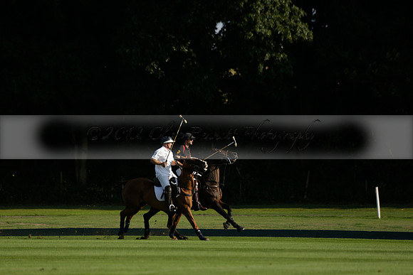 Pluma Negra (white) v Shoreline (black) in the Brecknock Cup Subsidiary final polo match played on Sunday 25 August 2013 at Cowdray Park Polo Club on Ambersham 1. 2013.10.12 www.polopictures.co.uk