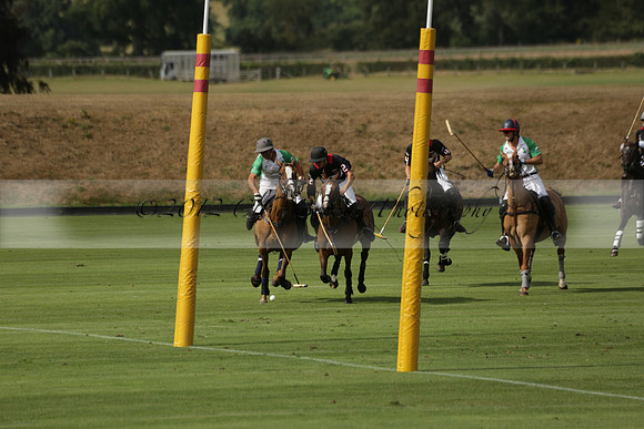 Jaeger Le Coultre (black)  v Wairakei Pastoral (white) in a Jaeger Le Coultre Holden White Cup polo match played on 29 July 2013 at Cowdray Park Polo Club on Brooksfieldwww.polopictures.co.uk