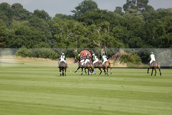 Jaeger Le Coultre (black)  v Wairakei Pastoral (white) in a Jaeger Le Coultre Holden White Cup polo match played on 29 July 2013 at Cowdray Park Polo Club on Brooksfieldwww.polopictures.co.uk