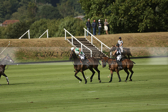 Jaeger Le Coultre (black)  v Wairakei Pastoral (white) in a Jaeger Le Coultre Holden White Cup polo match played on 29 July 2013 at Cowdray Park Polo Club on Brooksfieldwww.polopictures.co.uk