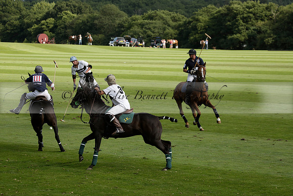 Pandas (white) v Home Farm (navy) in a Park House West Sussex Cup Polo match on Brooksfield at Cowdray Park Polo Club on Friday 30 August 2013. 2013.08.30 www.polopictures.co.uk