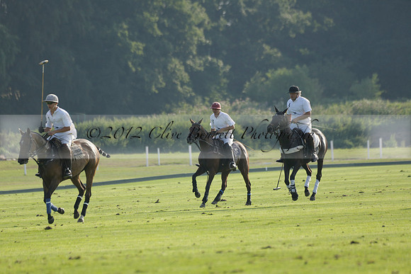 Pluma Negra (white) v Shoreline (black) in the Brecknock Cup Subsidiary final polo match played on Sunday 25 August 2013 at Cowdray Park Polo Club on Ambersham 1. 2013.10.12 www.polopictures.co.uk