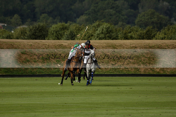 Jaeger Le Coultre (black)  v Wairakei Pastoral (white) in a Jaeger Le Coultre Holden White Cup polo match played on 29 July 2013 at Cowdray Park Polo Club on Brooksfieldwww.polopictures.co.uk
