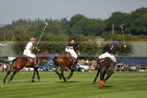 Pluma Negra (white) v Shoreline (black) in the Brecknock Cup Subsidiary final polo match played on Sunday 25 August 2013 at Cowdray Park Polo Club on Ambersham 1. 2013.10.12 www.polopictures.co.uk