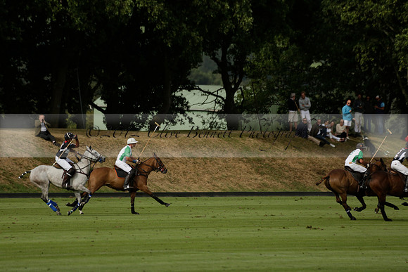 Jaeger Le Coultre (black)  v Wairakei Pastoral (white) in a Jaeger Le Coultre Holden White Cup polo match played on 29 July 2013 at Cowdray Park Polo Club on Brooksfieldwww.polopictures.co.uk