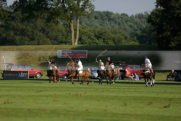 Pluma Negra (white) v Shoreline (black) in the Brecknock Cup Subsidiary final polo match played on Sunday 25 August 2013 at Cowdray Park Polo Club on Ambersham 1. 2013.10.12 www.polopictures.co.uk