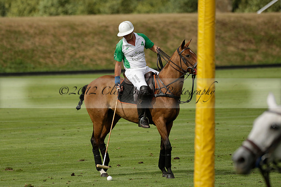 Jaeger Le Coultre (black)  v Wairakei Pastoral (white) in a Jaeger Le Coultre Holden White Cup polo match played on 29 July 2013 at Cowdray Park Polo Club on Brooksfieldwww.polopictures.co.uk