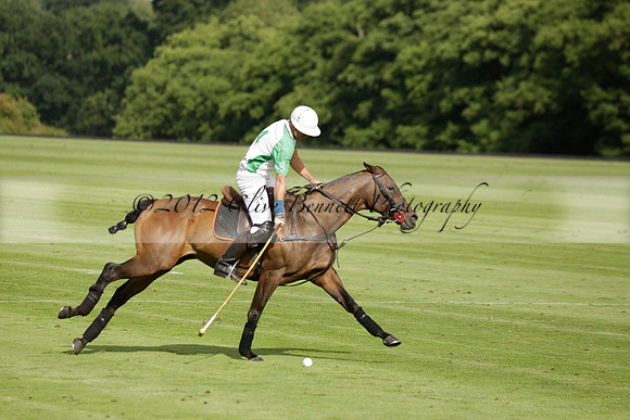 Jaeger Le Coultre (black)  v Wairakei Pastoral (white) in a Jaeger Le Coultre Holden White Cup polo match played on 29 July 2013 at Cowdray Park Polo Club on Brooksfieldwww.polopictures.co.uk