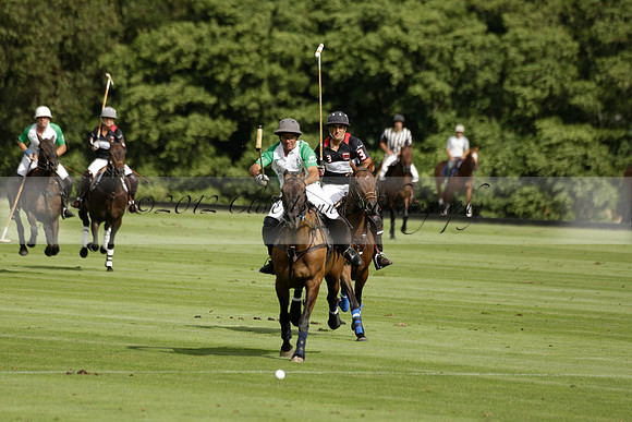 Jaeger Le Coultre (black)  v Wairakei Pastoral (white) in a Jaeger Le Coultre Holden White Cup polo match played on 29 July 2013 at Cowdray Park Polo Club on Brooksfieldwww.polopictures.co.uk