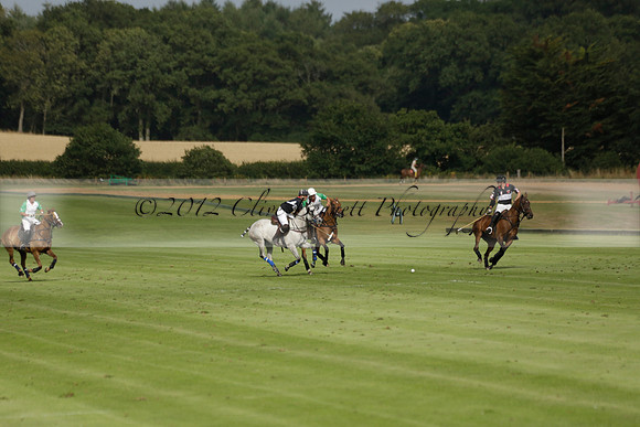 Jaeger Le Coultre (black)  v Wairakei Pastoral (white) in a Jaeger Le Coultre Holden White Cup polo match played on 29 July 2013 at Cowdray Park Polo Club on Brooksfieldwww.polopictures.co.uk