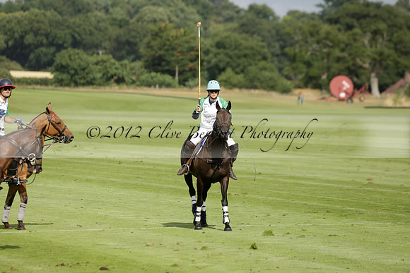 Jaeger Le Coultre (black)  v Wairakei Pastoral (white) in a Jaeger Le Coultre Holden White Cup polo match played on 29 July 2013 at Cowdray Park Polo Club on Brooksfieldwww.polopictures.co.uk