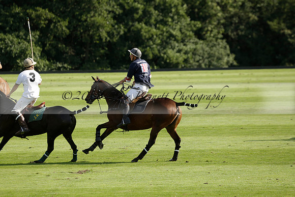 Pandas (white) v Home Farm (navy) in a Park House West Sussex Cup Polo match on Brooksfield at Cowdray Park Polo Club on Friday 30 August 2013. 2013.08.30 www.polopictures.co.uk