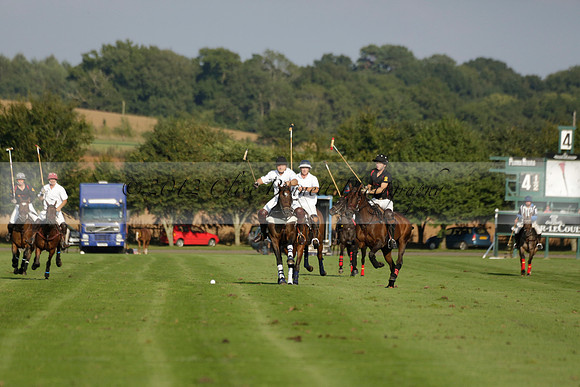 Pluma Negra (white) v Shoreline (black) in the Brecknock Cup Subsidiary final polo match played on Sunday 25 August 2013 at Cowdray Park Polo Club on Ambersham 1. 2013.10.12 www.polopictures.co.uk