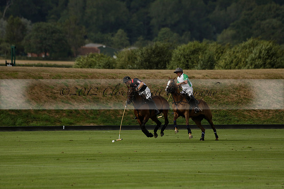 Jaeger Le Coultre (black)  v Wairakei Pastoral (white) in a Jaeger Le Coultre Holden White Cup polo match played on 29 July 2013 at Cowdray Park Polo Club on Brooksfieldwww.polopictures.co.uk