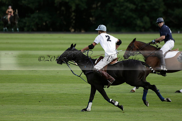 Pandas (white) v Home Farm (navy) in a Park House West Sussex Cup Polo match on Brooksfield at Cowdray Park Polo Club on Friday 30 August 2013. 2013.08.30 www.polopictures.co.uk