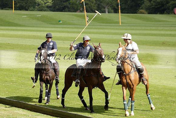 Pandas (white) v Home Farm (navy) in a Park House West Sussex Cup Polo match on Brooksfield at Cowdray Park Polo Club on Friday 30 August 2013. 2013.08.30 www.polopictures.co.uk