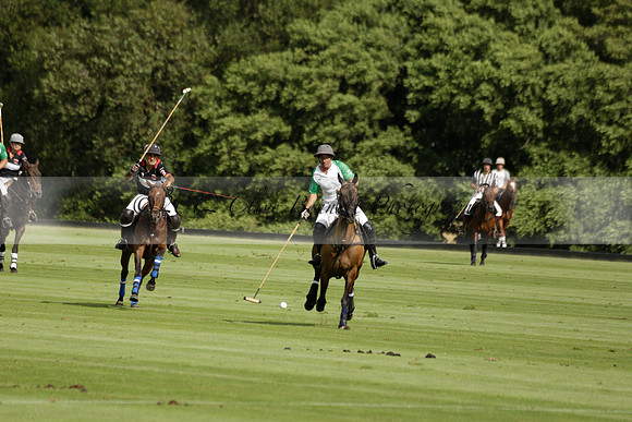 Jaeger Le Coultre (black)  v Wairakei Pastoral (white) in a Jaeger Le Coultre Holden White Cup polo match played on 29 July 2013 at Cowdray Park Polo Club on Brooksfieldwww.polopictures.co.uk