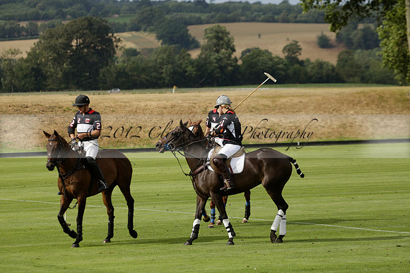Jaeger Le Coultre (black)  v Wairakei Pastoral (white) in a Jaeger Le Coultre Holden White Cup polo match played on 29 July 2013 at Cowdray Park Polo Club on Brooksfieldwww.polopictures.co.uk
