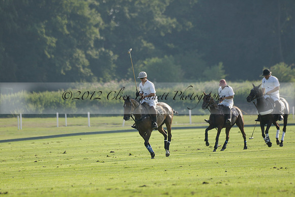 Pluma Negra (white) v Shoreline (black) in the Brecknock Cup Subsidiary final polo match played on Sunday 25 August 2013 at Cowdray Park Polo Club on Ambersham 1. 2013.10.12 www.polopictures.co.uk