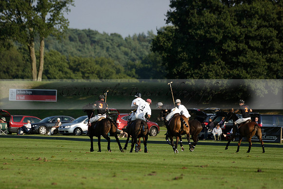 Pluma Negra (white) v Shoreline (black) in the Brecknock Cup Subsidiary final polo match played on Sunday 25 August 2013 at Cowdray Park Polo Club on Ambersham 1. 2013.10.12 www.polopictures.co.uk