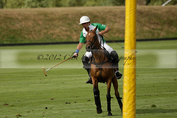 Jaeger Le Coultre (black)  v Wairakei Pastoral (white) in a Jaeger Le Coultre Holden White Cup polo match played on 29 July 2013 at Cowdray Park Polo Club on Brooksfieldwww.polopictures.co.uk