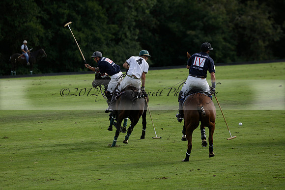 Pandas (white) v Home Farm (navy) in a Park House West Sussex Cup Polo match on Brooksfield at Cowdray Park Polo Club on Friday 30 August 2013. 2013.08.30 www.polopictures.co.uk