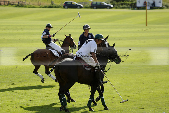Pandas (white) v Home Farm (navy) in a Park House West Sussex Cup Polo match on Brooksfield at Cowdray Park Polo Club on Friday 30 August 2013. 2013.08.30 www.polopictures.co.uk