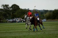 Ghost Chilli (blue) v Team Tonic (red) in a Lodsworth Cup Polo match on Ambersham 3 at Cowdray Park Polo Club on Friday 30 August 2013. 2013.08.30 www.polopictures.co.uk