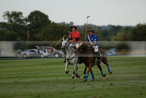 Ghost Chilli (blue) v Team Tonic (red) in a Lodsworth Cup Polo match on Ambersham 3 at Cowdray Park Polo Club on Friday 30 August 2013. 2013.08.30 www.polopictures.co.uk