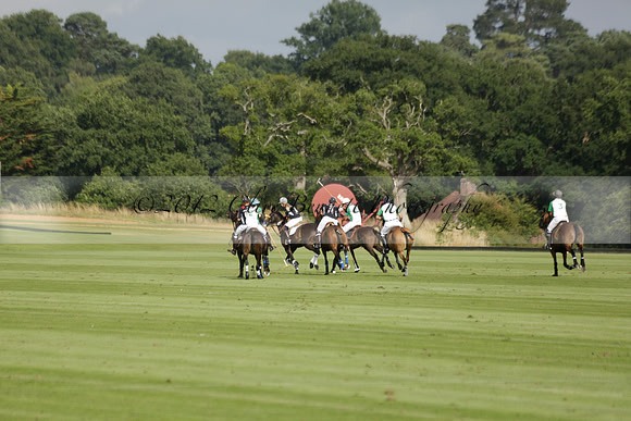 Jaeger Le Coultre (black)  v Wairakei Pastoral (white) in a Jaeger Le Coultre Holden White Cup polo match played on 29 July 2013 at Cowdray Park Polo Club on Brooksfieldwww.polopictures.co.uk