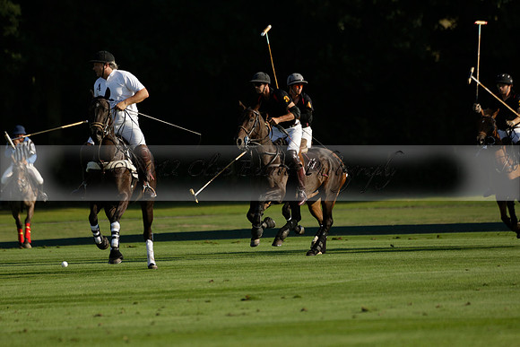 Pluma Negra (white) v Shoreline (black) in the Brecknock Cup Subsidiary final polo match played on Sunday 25 August 2013 at Cowdray Park Polo Club on Ambersham 1. 2013.10.12 www.polopictures.co.uk