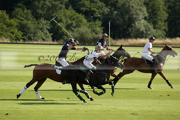 Pandas (white) v Home Farm (navy) in a Park House West Sussex Cup Polo match on Brooksfield at Cowdray Park Polo Club on Friday 30 August 2013. 2013.08.30 www.polopictures.co.uk
