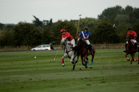 Ghost Chilli (blue) v Team Tonic (red) in a Lodsworth Cup Polo match on Ambersham 3 at Cowdray Park Polo Club on Friday 30 August 2013. 2013.08.30 www.polopictures.co.uk