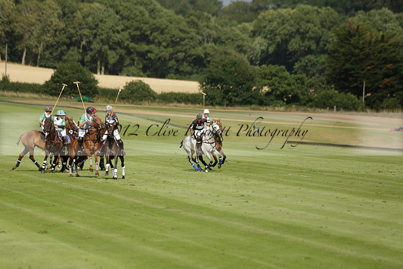 Jaeger Le Coultre (black)  v Wairakei Pastoral (white) in a Jaeger Le Coultre Holden White Cup polo match played on 29 July 2013 at Cowdray Park Polo Club on Brooksfieldwww.polopictures.co.uk