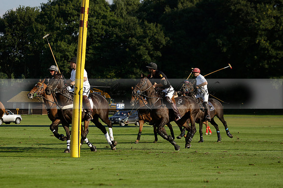 Pluma Negra (white) v Shoreline (black) in the Brecknock Cup Subsidiary final polo match played on Sunday 25 August 2013 at Cowdray Park Polo Club on Ambersham 1. 2013.10.12 www.polopictures.co.uk