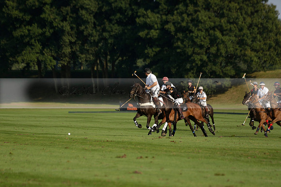 Pluma Negra (white) v Shoreline (black) in the Brecknock Cup Subsidiary final polo match played on Sunday 25 August 2013 at Cowdray Park Polo Club on Ambersham 1. 2013.10.12 www.polopictures.co.uk