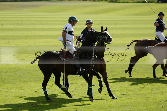 Pandas (white) v Home Farm (navy) in a Park House West Sussex Cup Polo match on Brooksfield at Cowdray Park Polo Club on Friday 30 August 2013. 2013.08.30 www.polopictures.co.uk