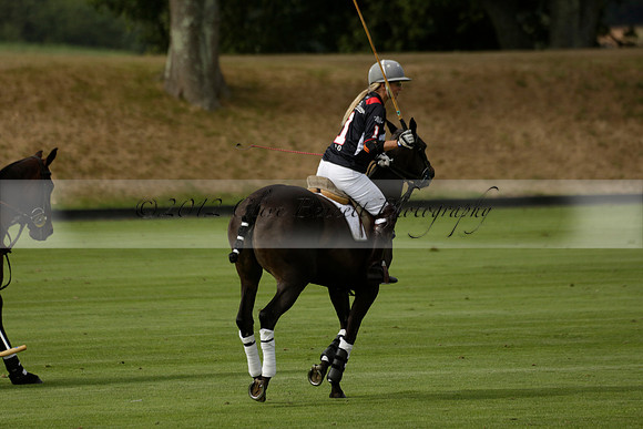 Jaeger Le Coultre (black)  v Wairakei Pastoral (white) in a Jaeger Le Coultre Holden White Cup polo match played on 29 July 2013 at Cowdray Park Polo Club on Brooksfieldwww.polopictures.co.uk