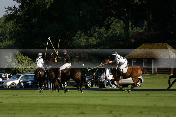 Pluma Negra (white) v Shoreline (black) in the Brecknock Cup Subsidiary final polo match played on Sunday 25 August 2013 at Cowdray Park Polo Club on Ambersham 1. 2013.10.12 www.polopictures.co.uk